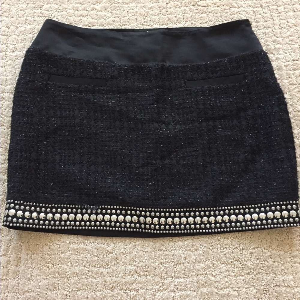 Just Cavalli black mini skirt w metal studded hem.